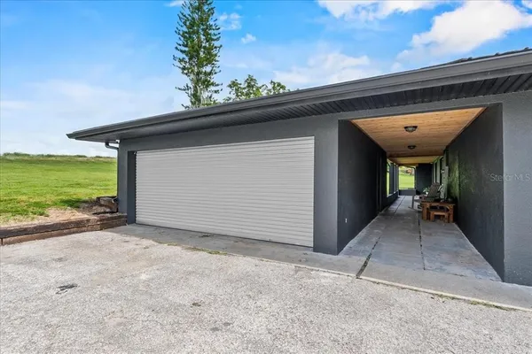 a view of a house with a garage