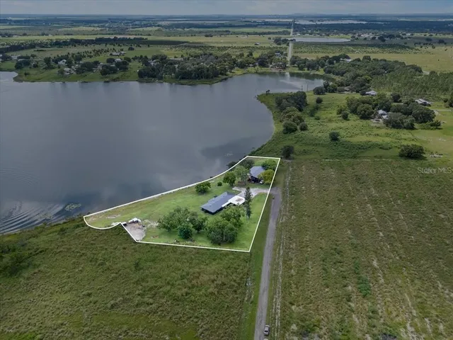 a view of a lake in middle of the town
