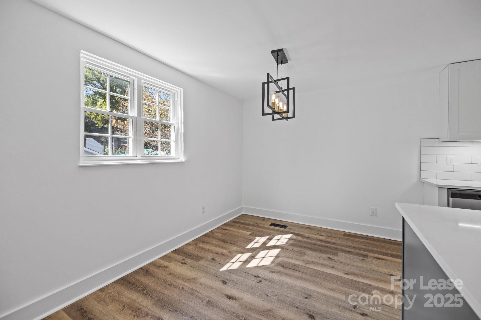 7120 Clear Crossing Lane Mint Hill, NC 28227 - Photo 12 of 27 a room with a bed and a window