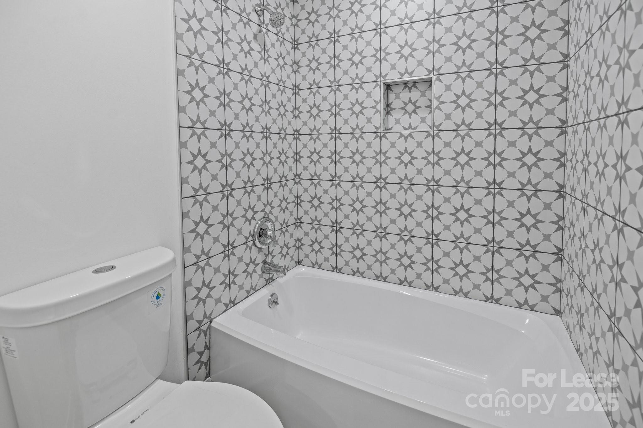 7120 Clear Crossing Lane Mint Hill, NC 28227 - Photo 14 of 27 a bathroom with a toilet and a shower