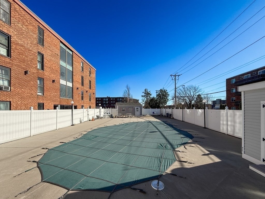 175 Ward Street, Unit 35 Revere, MA 02151 - Photo 13 of 19 a view of a backyard with sitting area