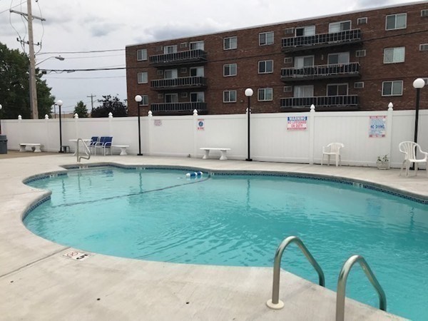 175 Ward Street, Unit 35 Revere, MA 02151 - Photo 14 of 19 a view of a swimming pool with a yard
