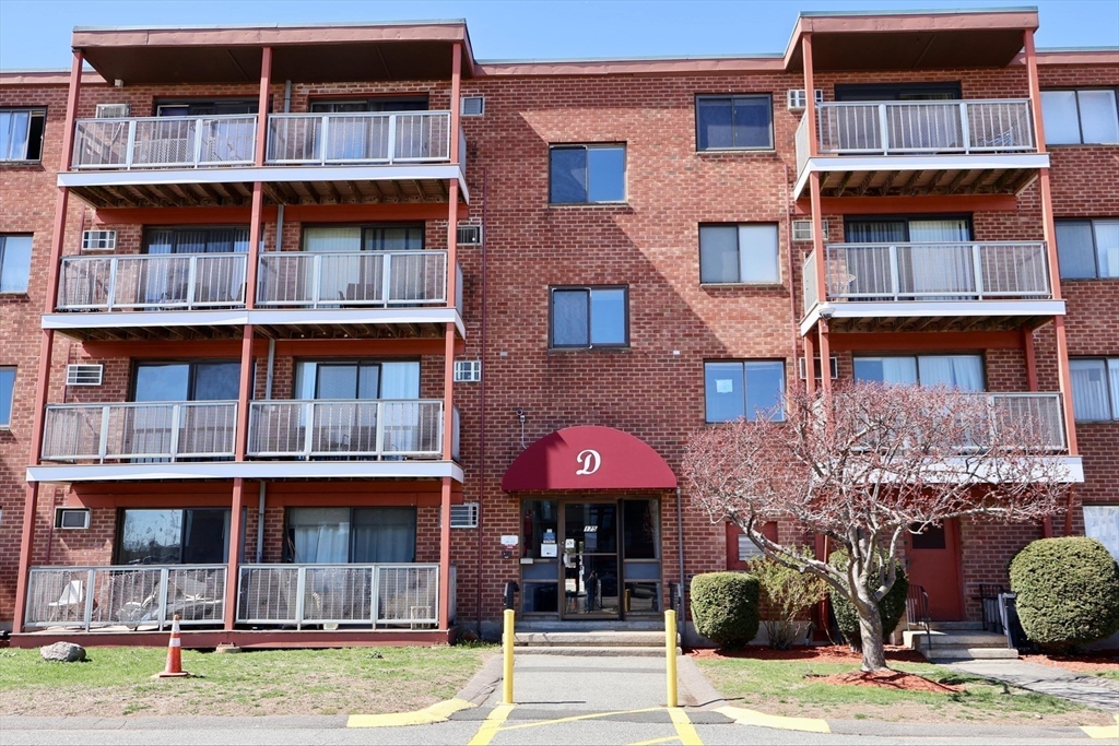 175 Ward Street, Unit 35 Revere, MA 02151 - Photo 15 of 19 a front view of a building with a garden and plants