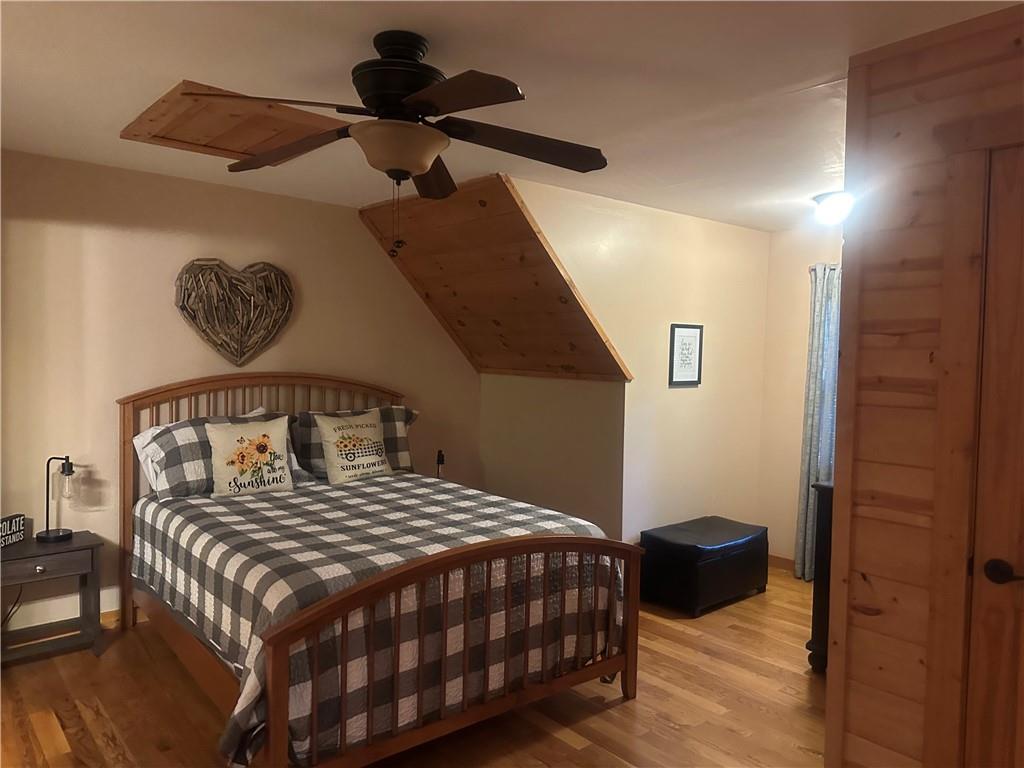 105 Ranch Mountain Court Dahlonega, GA 30533 - Photo 27 of 70 a bedroom with a bed and a window