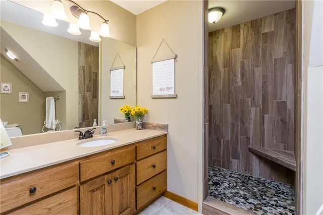 a room with furniture pool table and a window