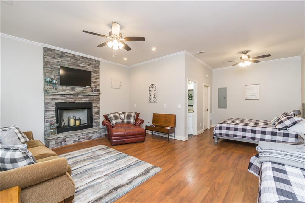 105 Ranch Mountain Court Dahlonega, GA 30533 - Photo 35 of 70 a living room with furniture and a fireplace