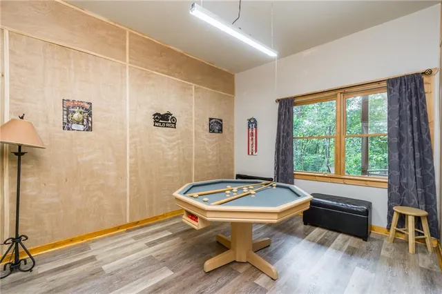 a view of a patio with a table chairs