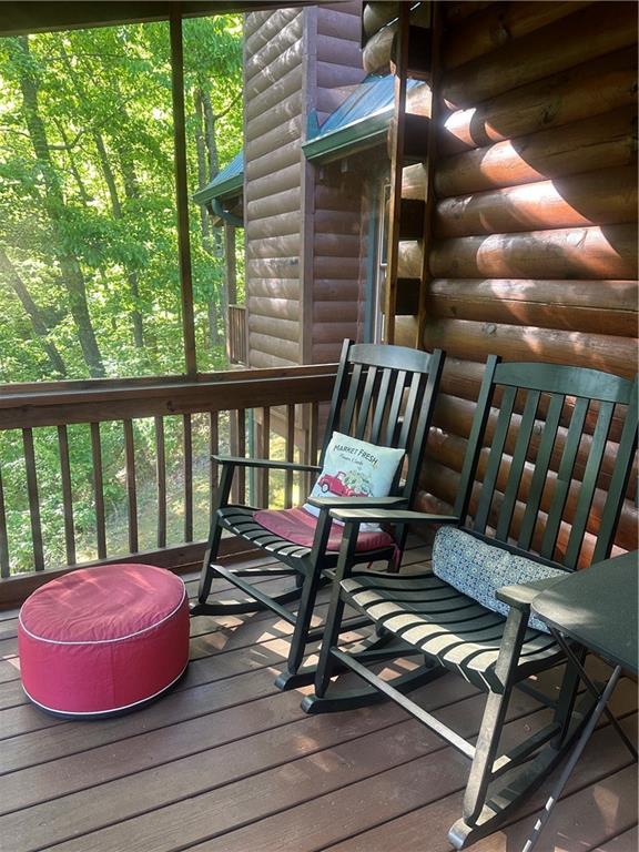 105 Ranch Mountain Court Dahlonega, GA 30533 - Photo 45 of 70 a view of a chairs and tables in patio