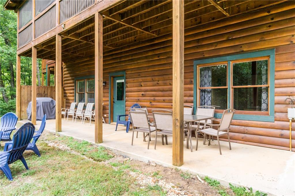 105 Ranch Mountain Court Dahlonega, GA 30533 - Photo 47 of 70 a building outdoor space with patio furniture and potted plant