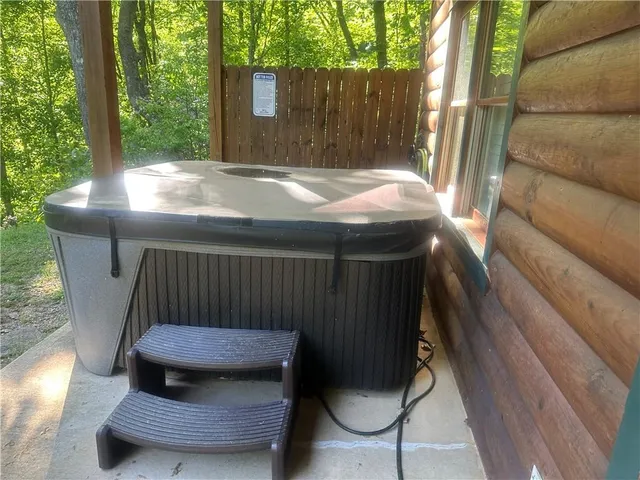 an aerial view of a house with outdoor space and street view
