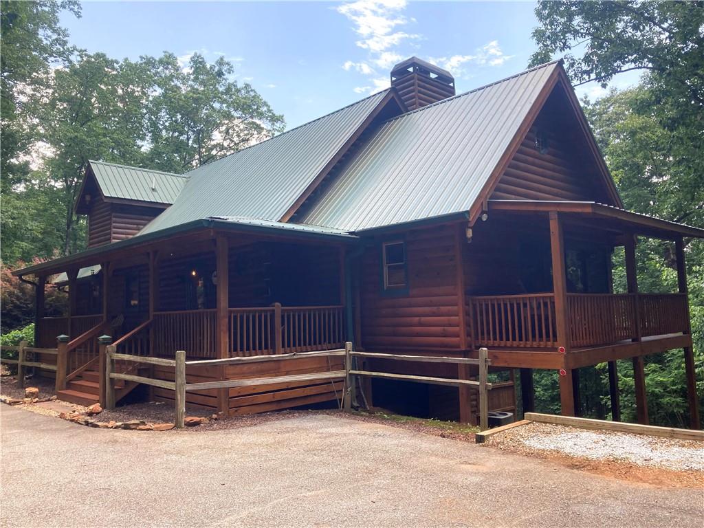 105 Ranch Mountain Court Dahlonega, GA 30533 - Photo 55 of 70 a house view with a backyard space