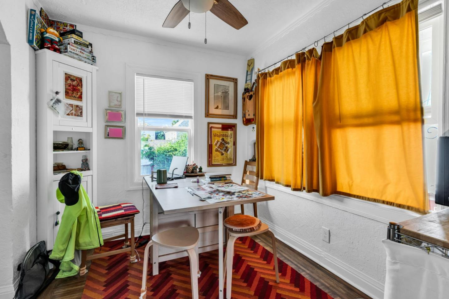 852 58th Street Oakland, CA 94608 - Photo 52 of 64 a view of a dining room with furniture and window
