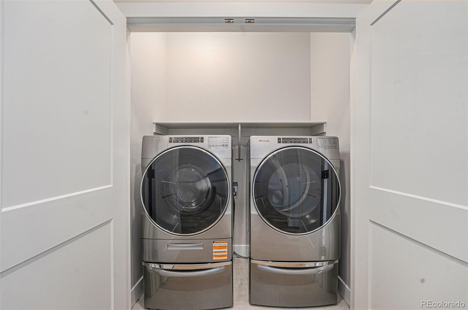 15 Explorers Avenue Fraser, CO 80442 - Photo 21 of 25 a utility room with dryer and washer