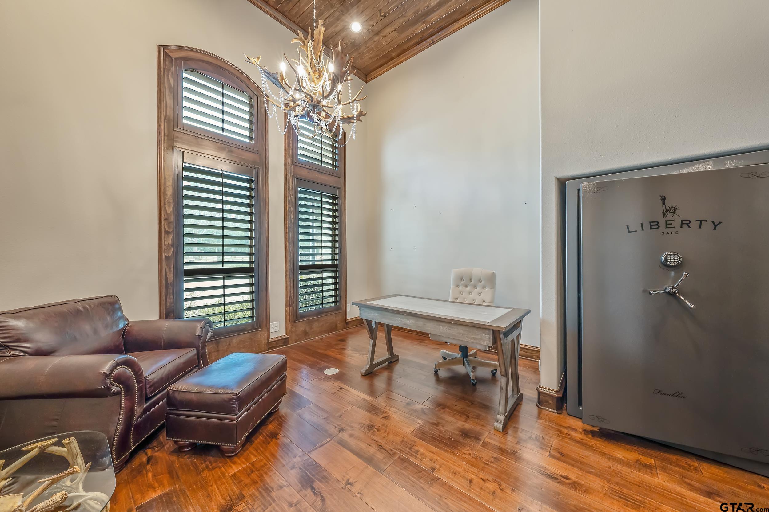 13793 Peninsula Road Whitehouse, TX 75791 - Photo 11 of 48 a living room with furniture and a chandelier