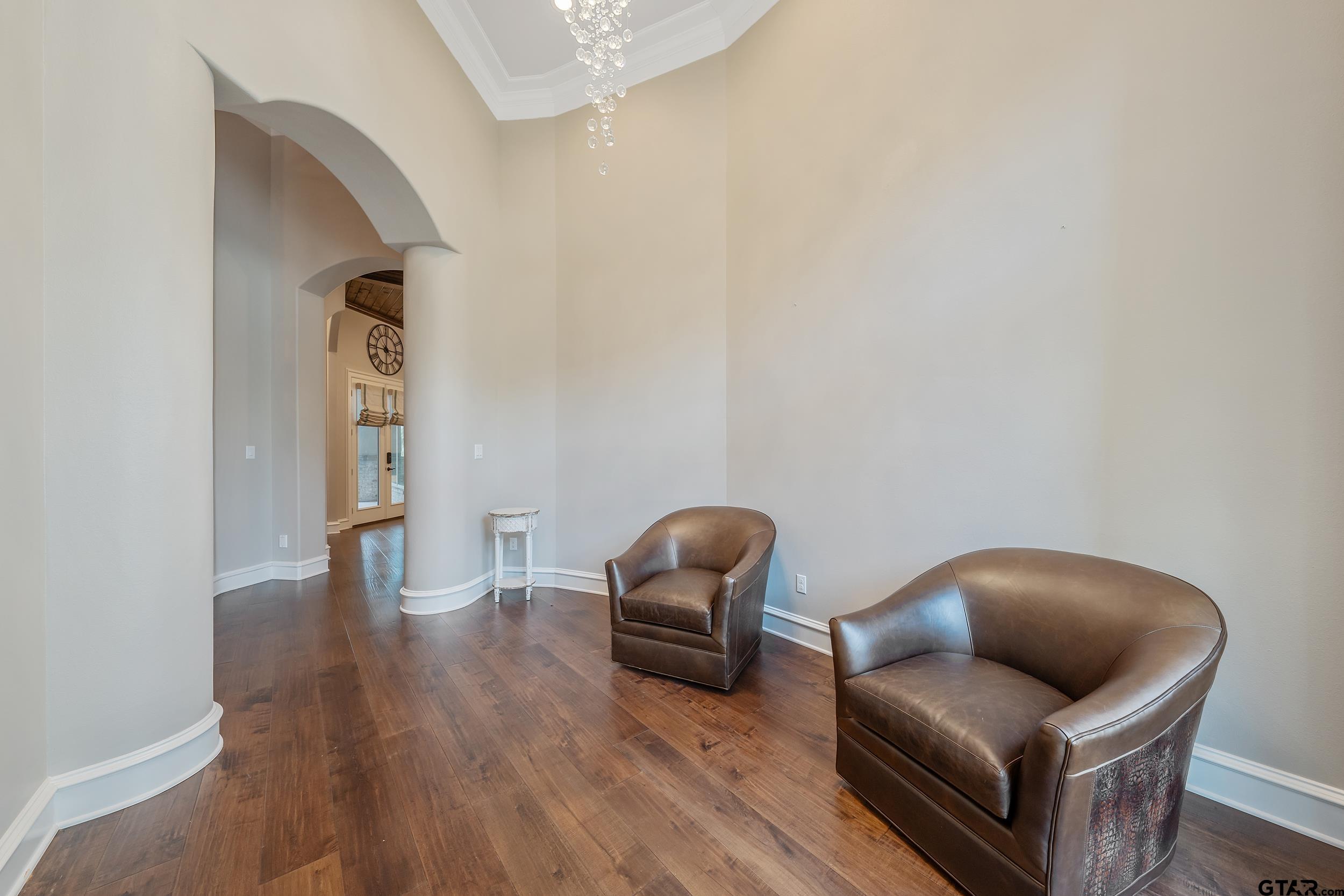 13793 Peninsula Road Whitehouse, TX 75791 - Photo 26 of 48 a hallway with a chair and a couch