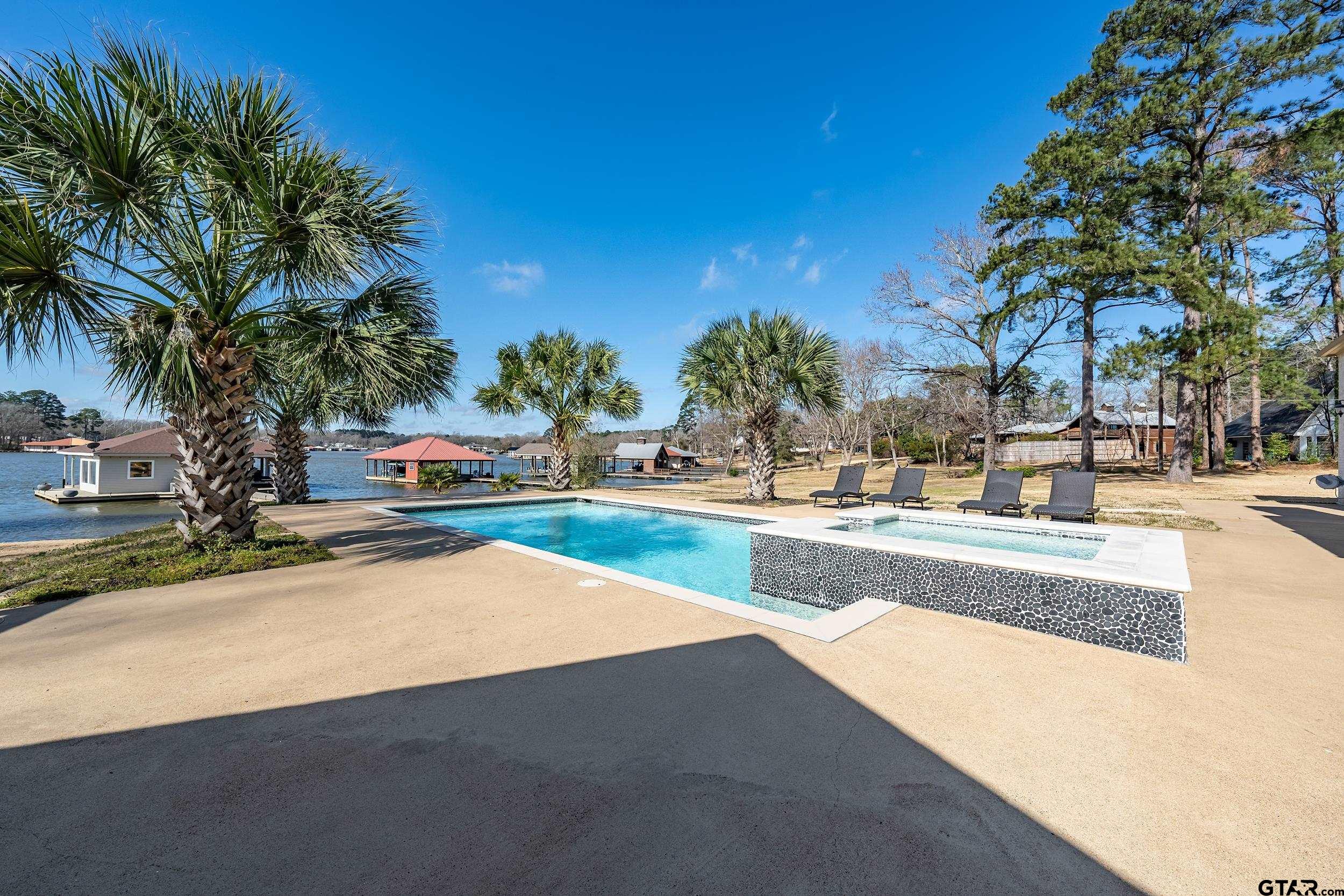 13793 Peninsula Road Whitehouse, TX 75791 - Photo 37 of 48 a view of outdoor space with swimming pool and sitting area