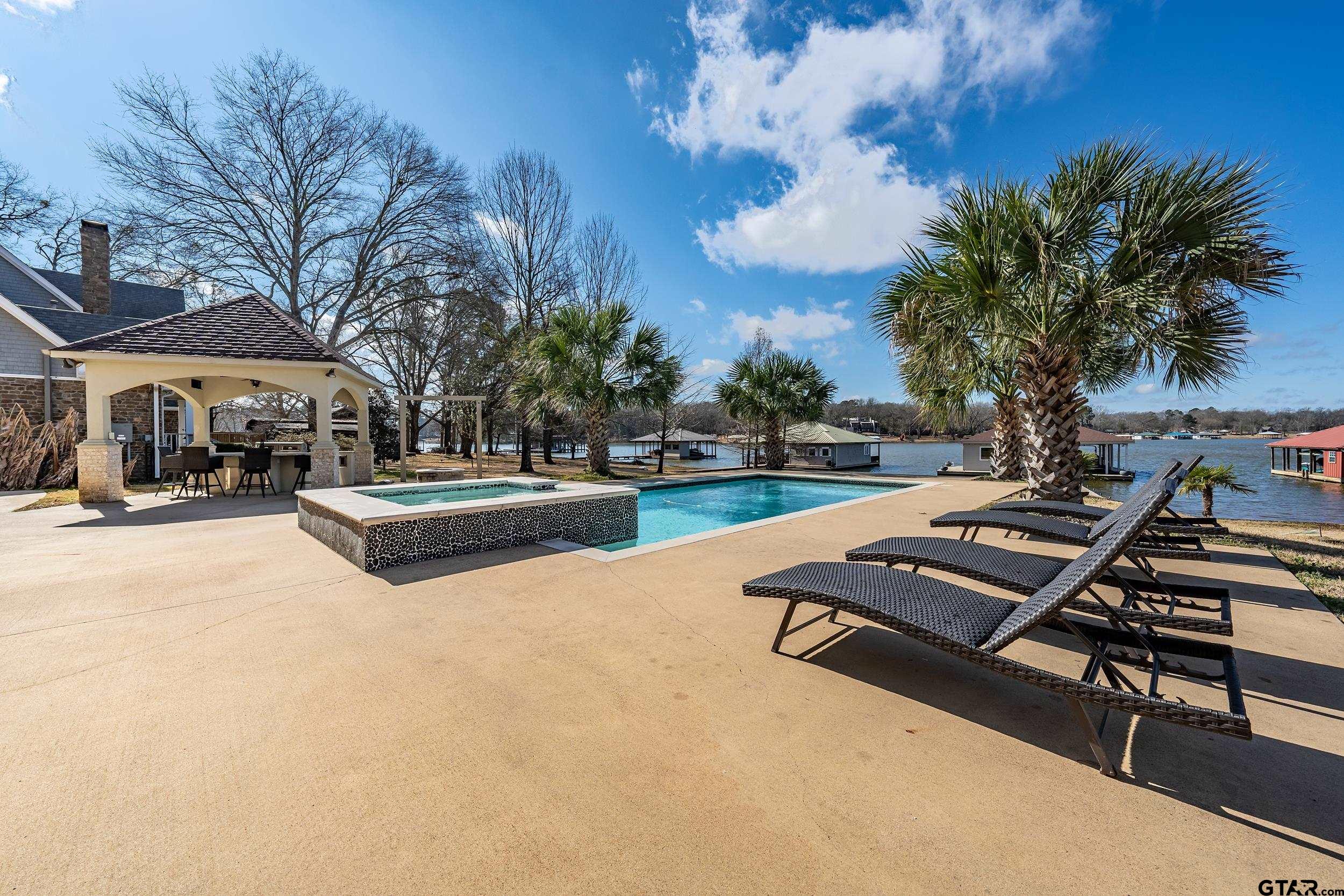 13793 Peninsula Road Whitehouse, TX 75791 - Photo 38 of 48 a view of swimming pool with chairs