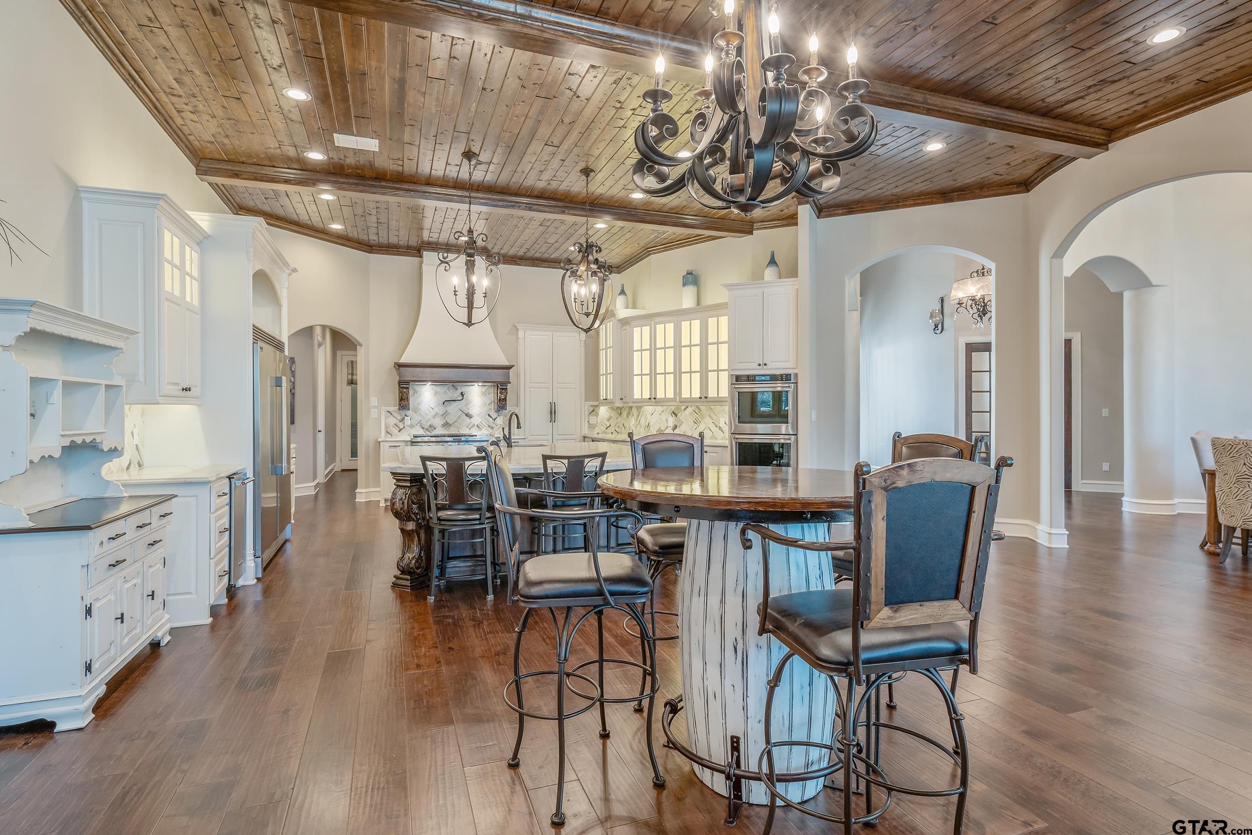 13793 Peninsula Road Whitehouse, TX 75791 - Photo 4 of 48 a view of a dining room with furniture window and wooden floor