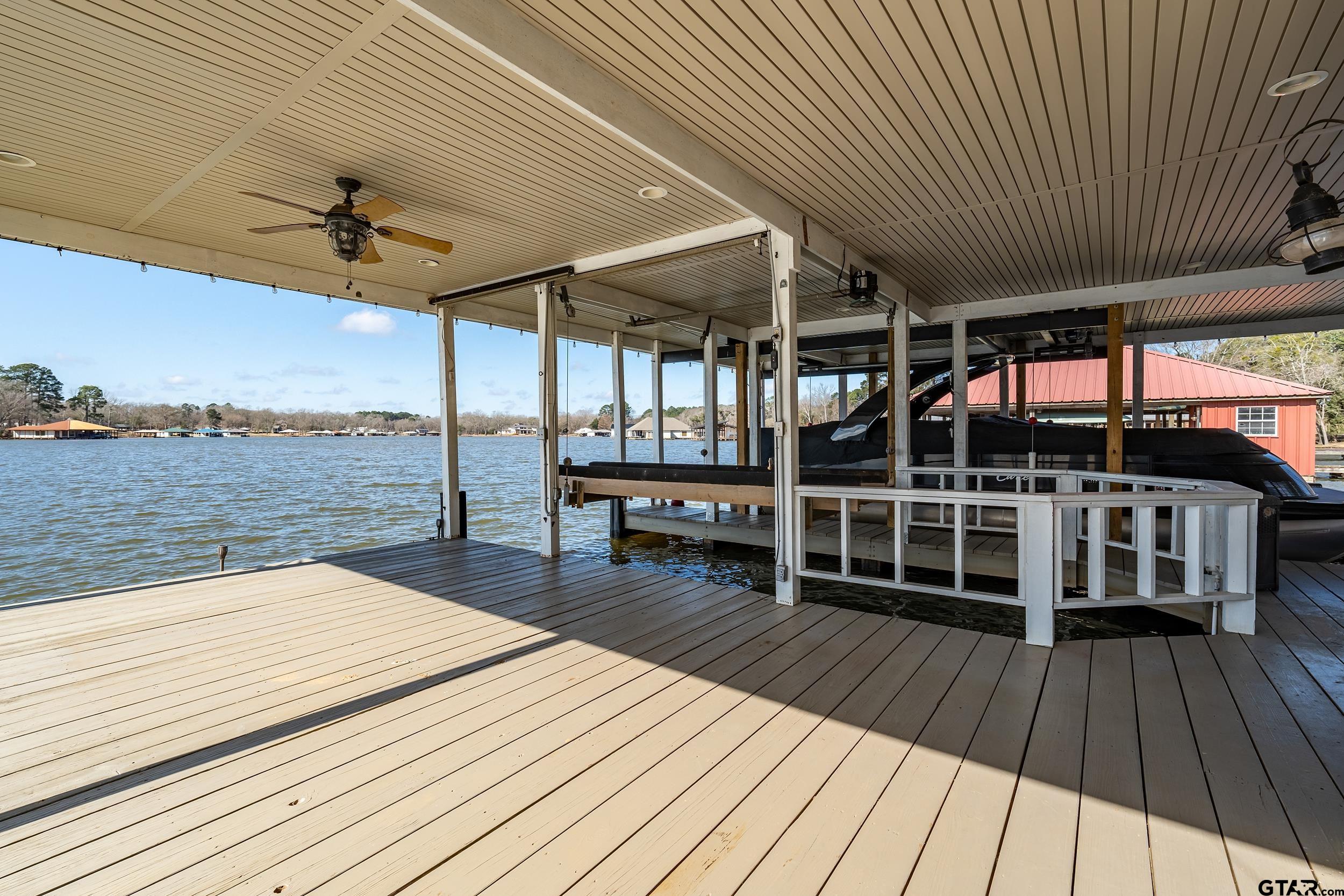 13793 Peninsula Road Whitehouse, TX 75791 - Photo 42 of 48 a view of a balcony with wooden floor