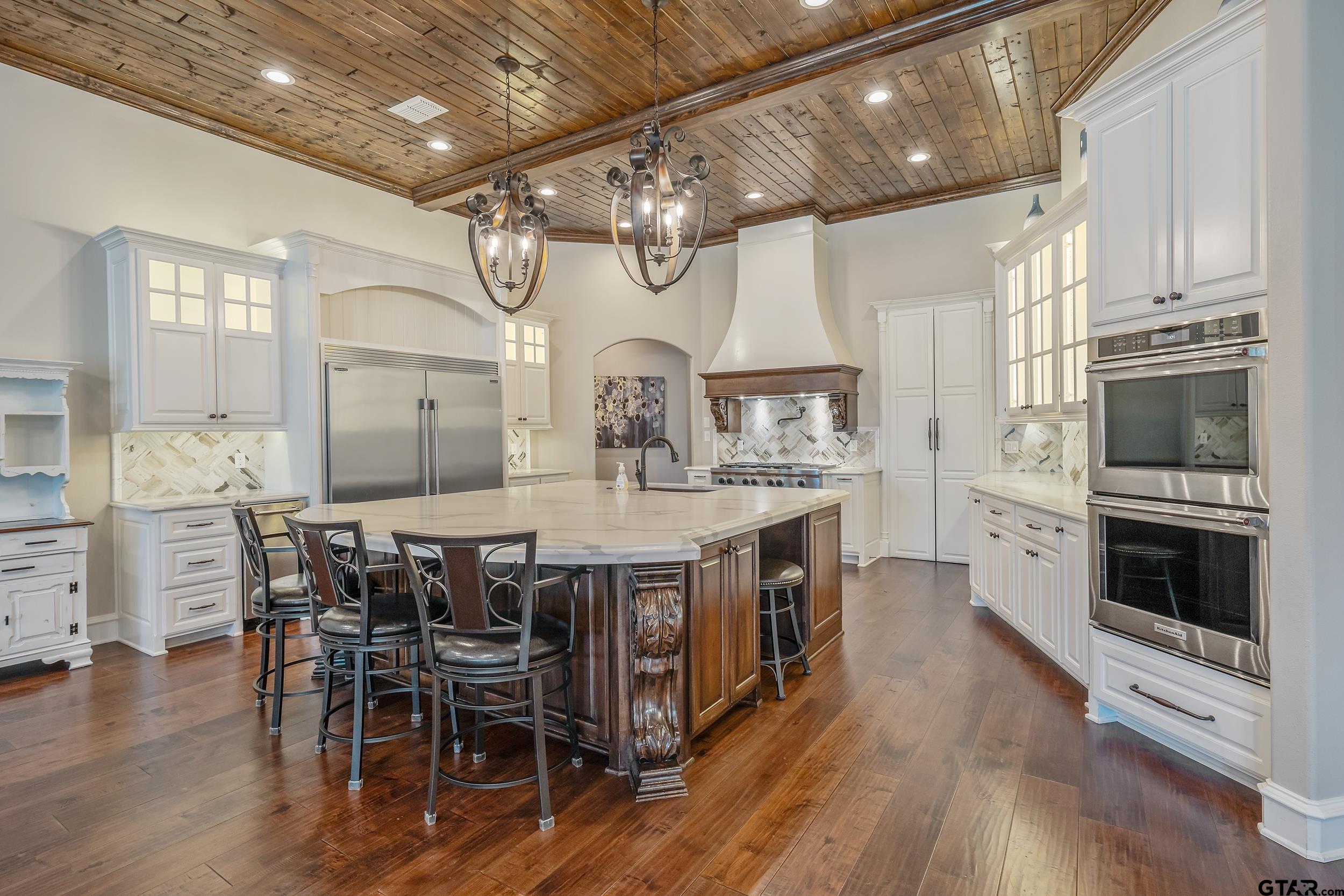 13793 Peninsula Road Whitehouse, TX 75791 - Photo 5 of 48 a view of a dining room with furniture window and wooden floor