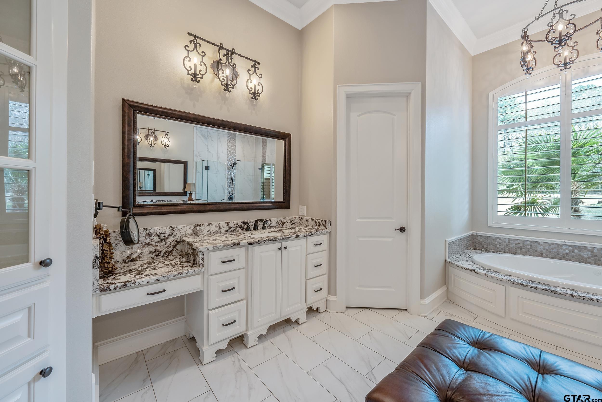 13793 Peninsula Road Whitehouse, TX 75791 - Photo 7 of 48 a bathroom with a sink and a bathtub