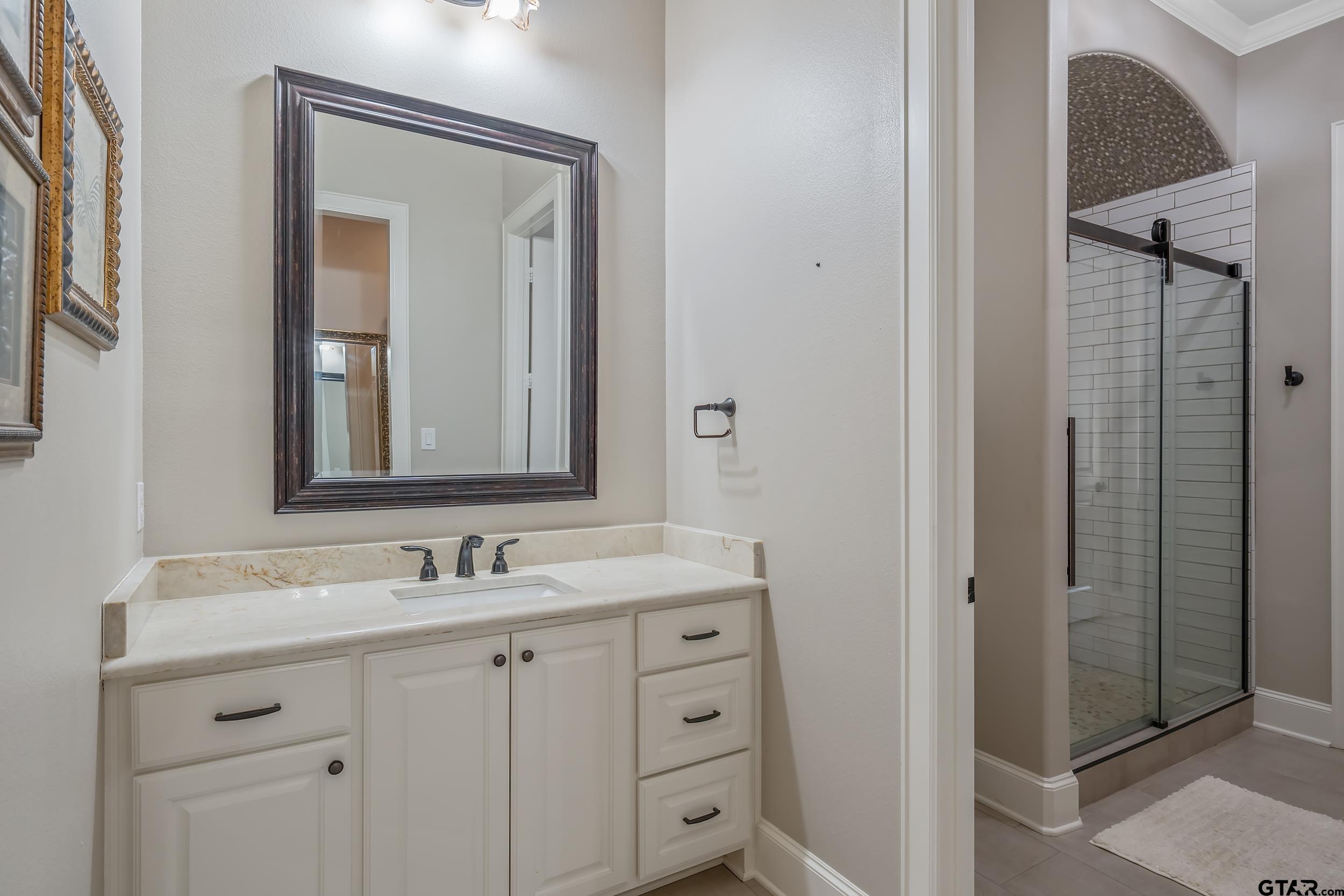 13793 Peninsula Road Whitehouse, TX 75791 - Photo 8 of 48 a bathroom with a granite countertop sink vanity and mirror
