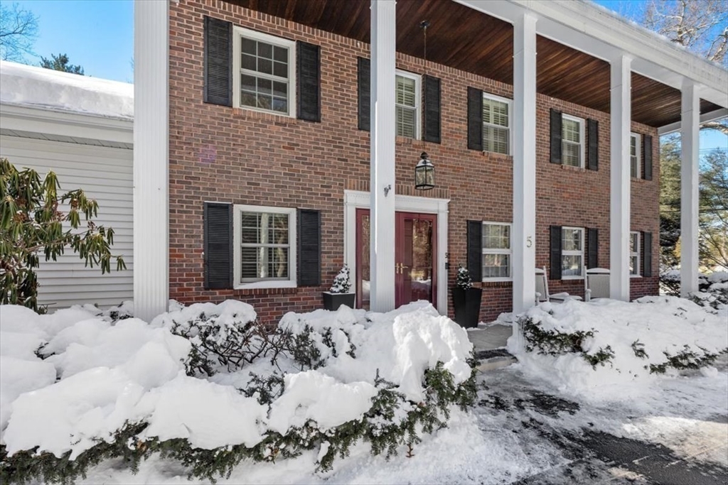 5 Old County Road Hingham, MA 02043 - Photo 1 of 42 a view of a house with a yard covered in snow