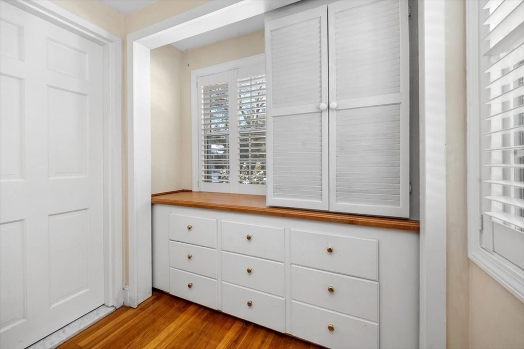 5 Old County Road Hingham, MA 02043 - Photo 27 of 42 a view of an empty room with wooden floor and a window