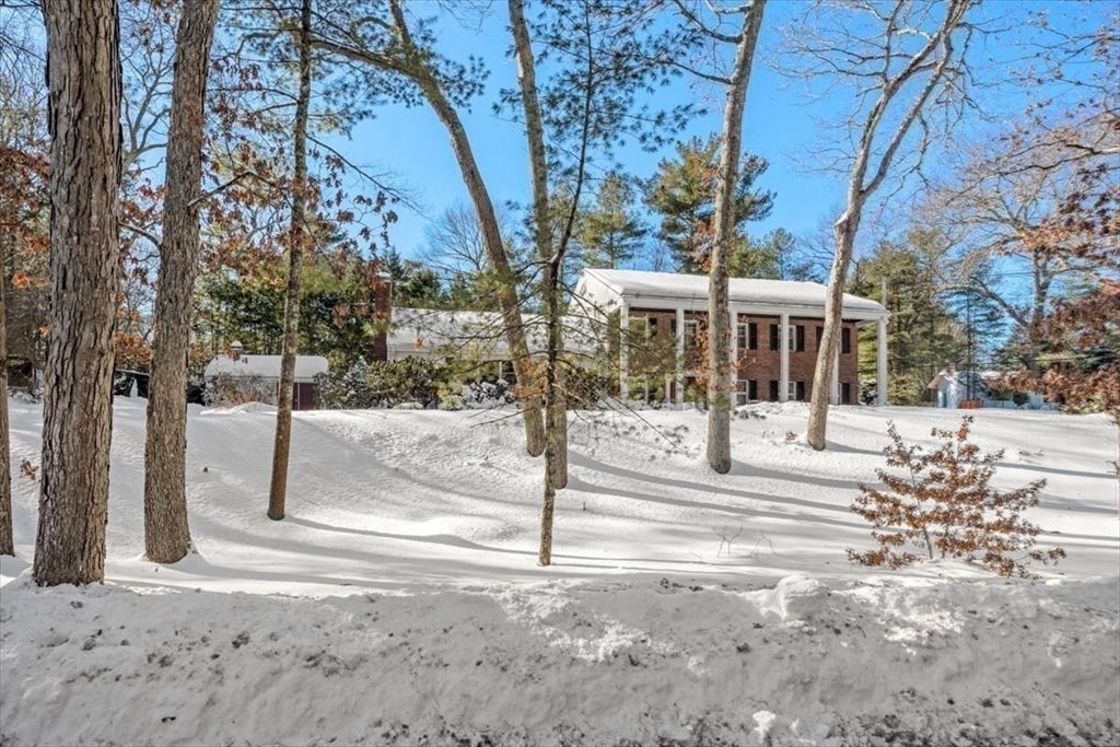 5 Old County Road Hingham, MA 02043 - Photo 3 of 42 a view of a building with a yard