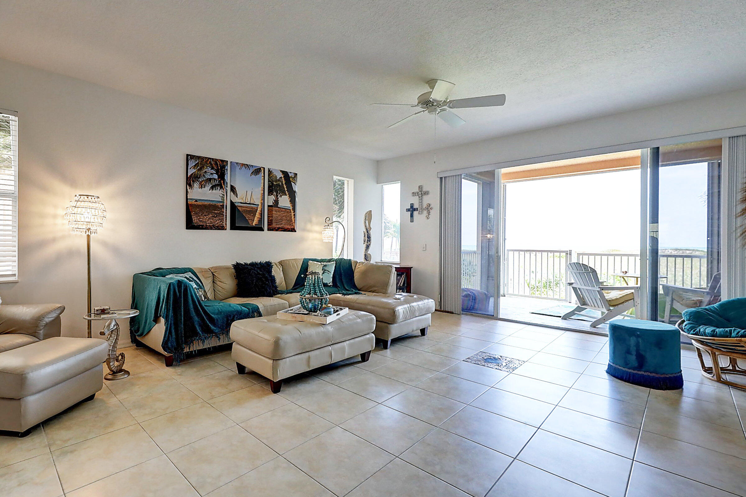 1002 Windward Drive Fort Pierce, FL 34949 - Photo 11 of 122 a living room with furniture and a large window