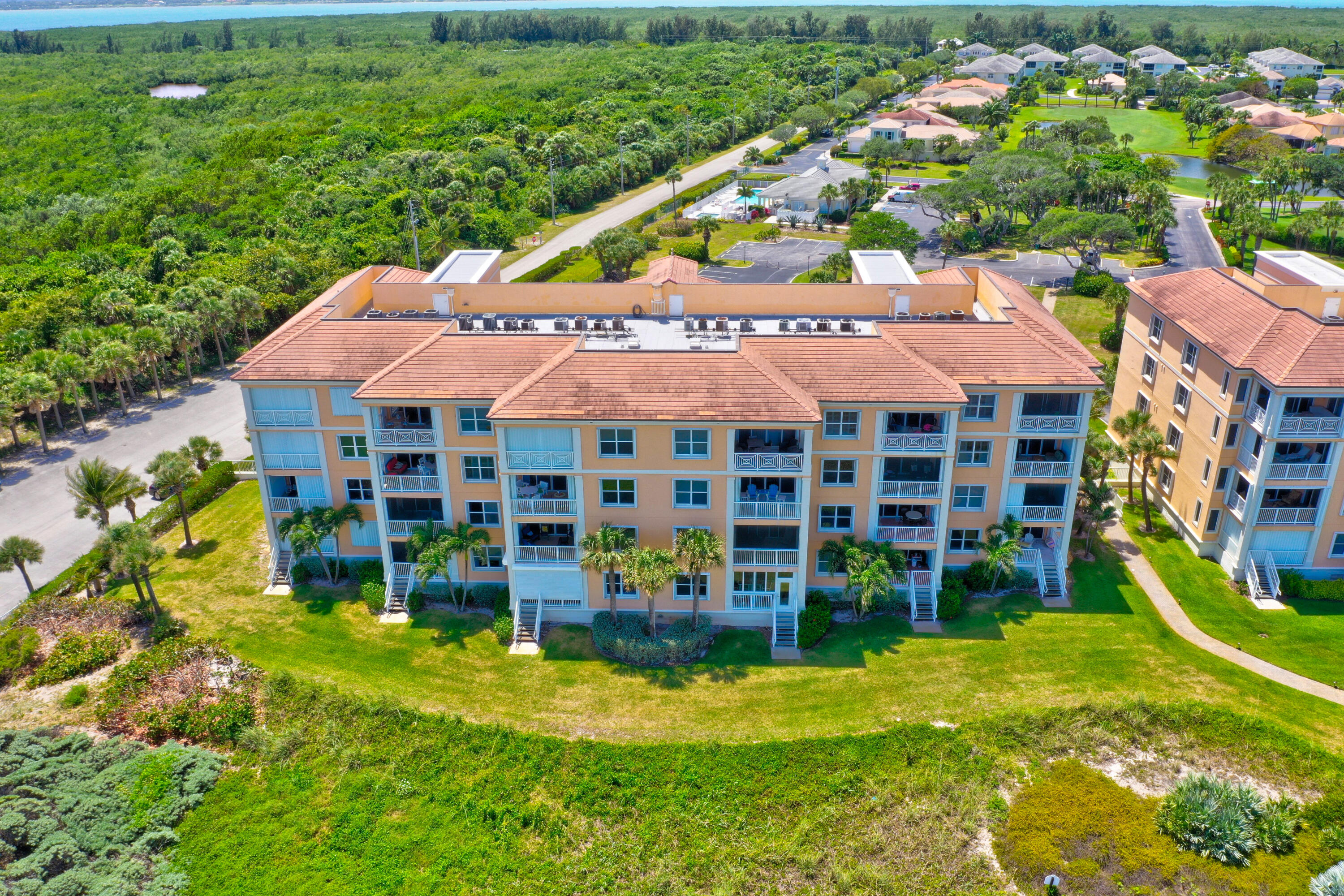 1002 Windward Drive Fort Pierce, FL 34949 - Photo 113 of 122 a view of a house with a yard table and chairs