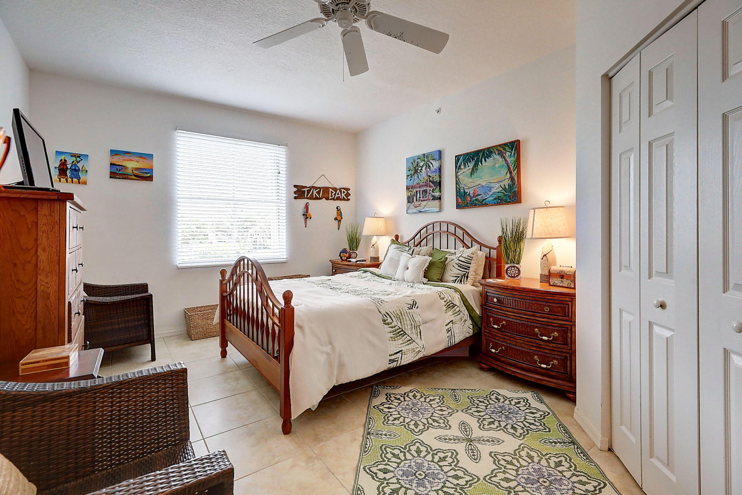 1002 Windward Drive Fort Pierce, FL 34949 - Photo 17 of 122 a bedroom with a bed and a window