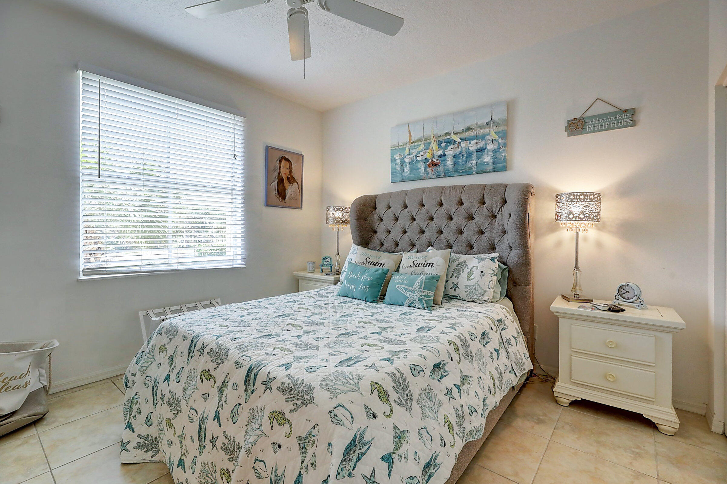 1002 Windward Drive Fort Pierce, FL 34949 - Photo 18 of 122 a bedroom with a bed and a window