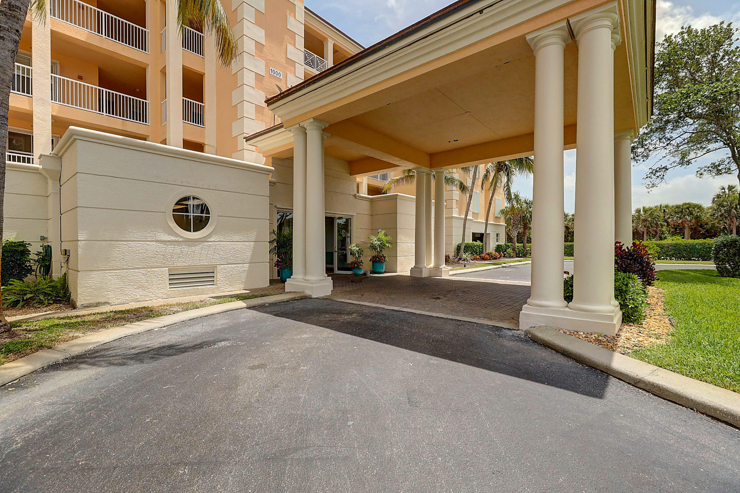 1002 Windward Drive Fort Pierce, FL 34949 - Photo 68 of 122 front view of a building with a street