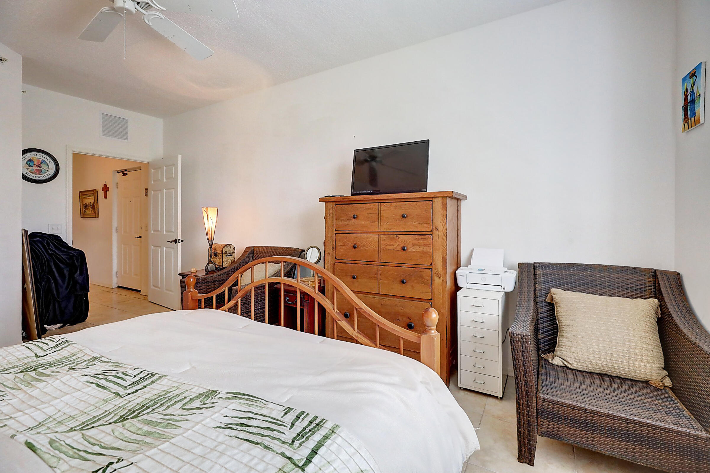 1002 Windward Drive Fort Pierce, FL 34949 - Photo 75 of 122 a bedroom with a bed and a television