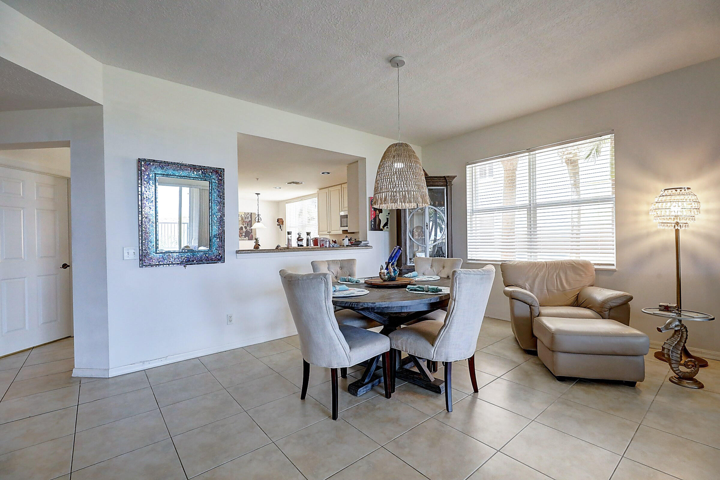 1002 Windward Drive Fort Pierce, FL 34949 - Photo 79 of 122 a living room with furniture and a large window