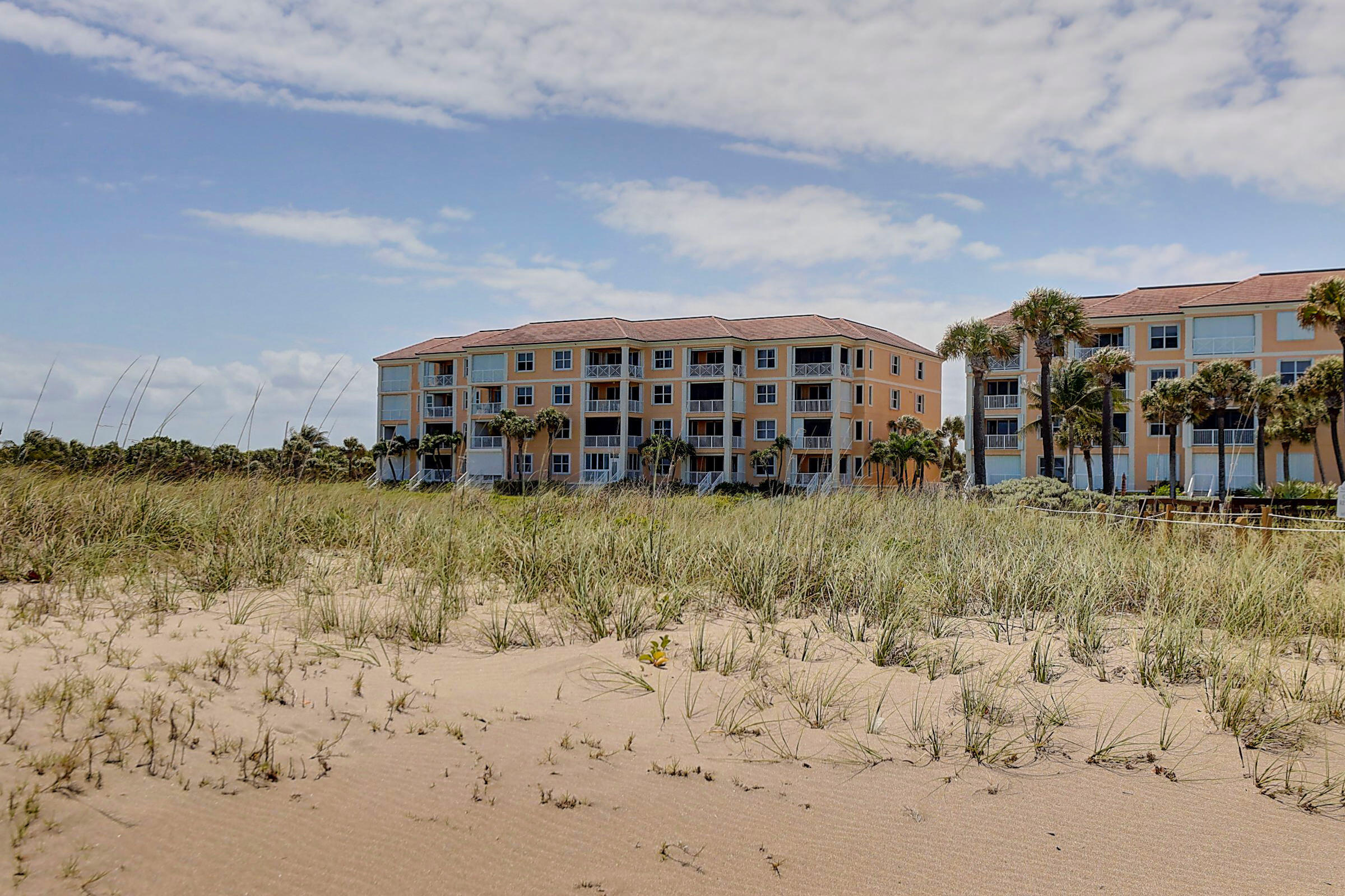 1002 Windward Drive Fort Pierce, FL 34949 - Photo 99 of 122 a view of a house with a yard covered in snow