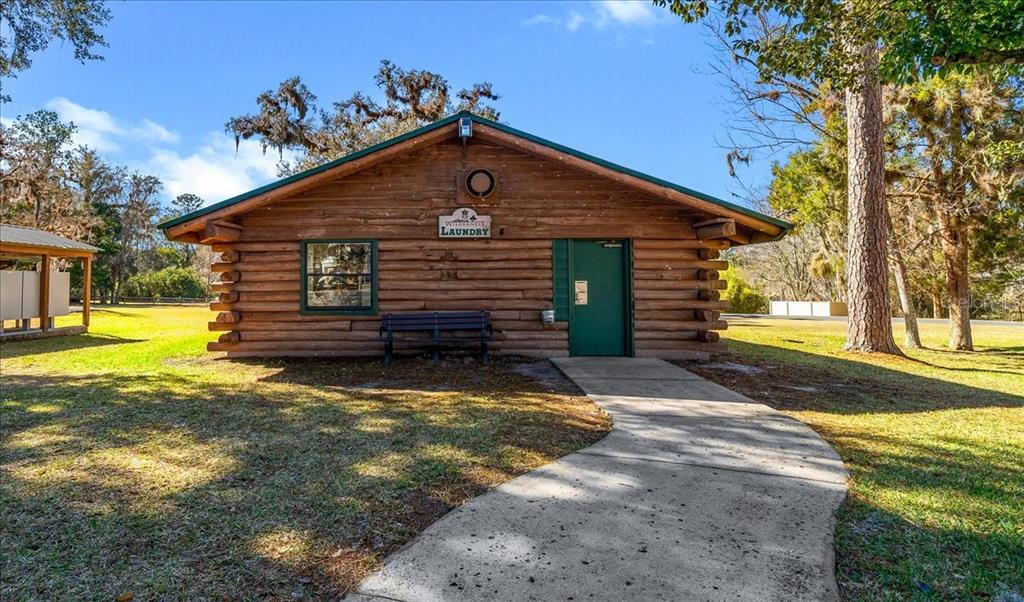 3259 Northeast 102nd Ave Road Silver Springs, FL 34488 - Photo 63 of 99 a view of a house with a yard