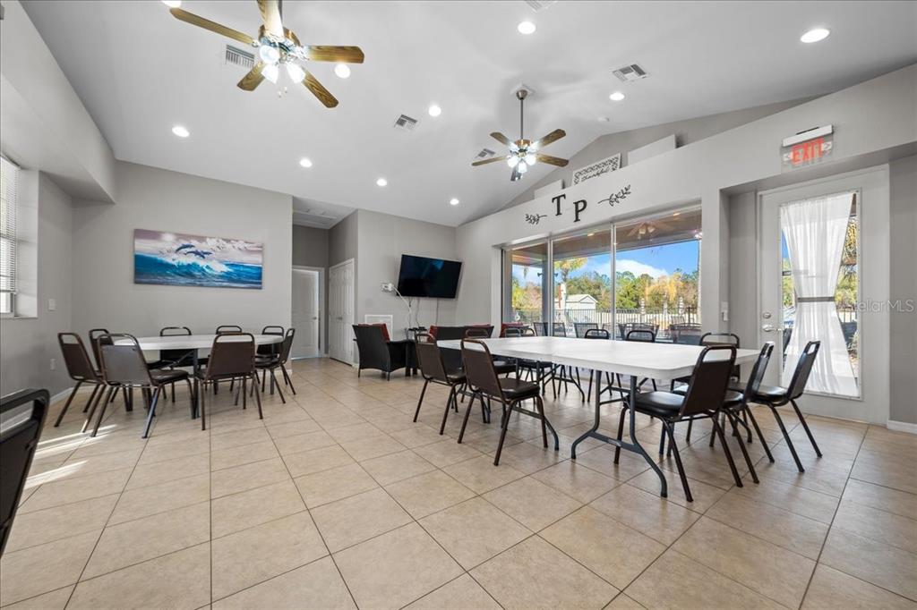 3259 Northeast 102nd Ave Road Silver Springs, FL 34488 - Photo 88 of 99 a view of a dining area with furniture