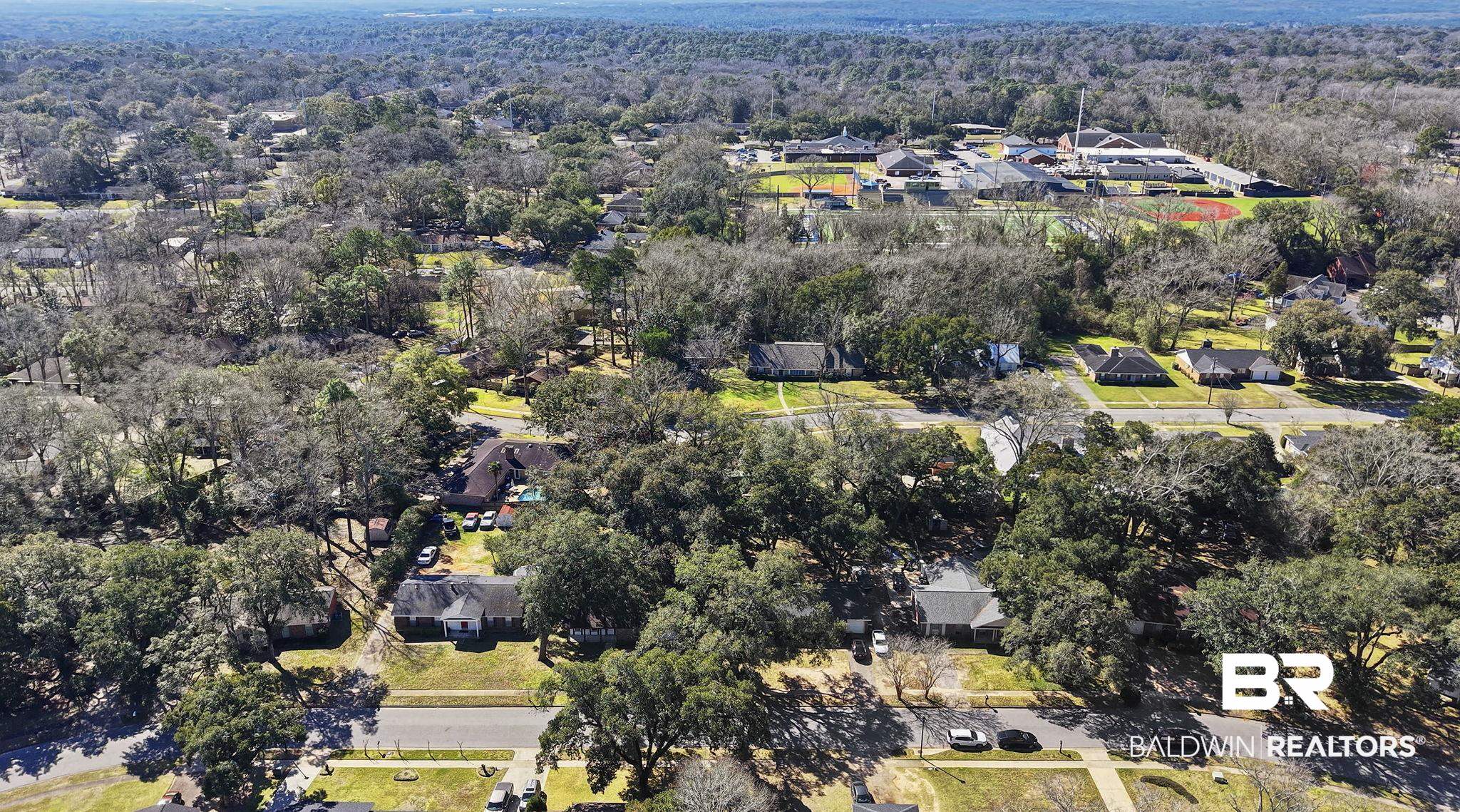5817 Woodgate Road Mobile, AL 36609 - Photo 84 of 85 Drone / aerial view featuring a residential view and a wooded view