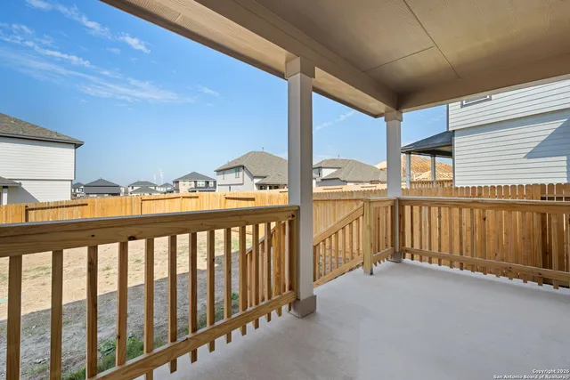 a view of a swimming pool with a lounge chairs