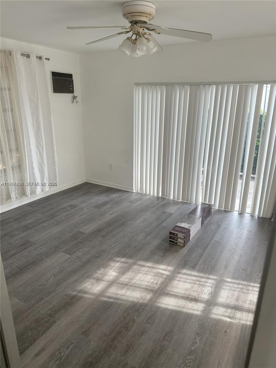 3268 Southwest 25th Street, Unit 3268 Miami, FL 33133 - Photo 10 of 17 a view of a hallway with wooden floor