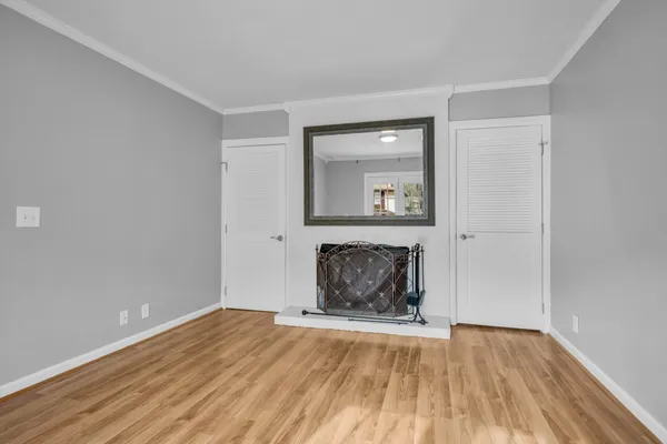 a bathroom with a sink vanity and mirror