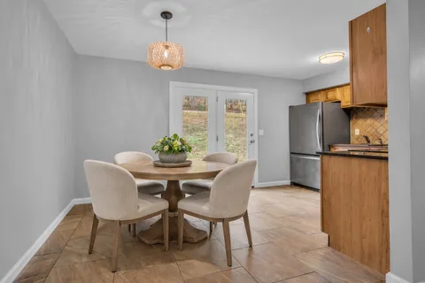 a view of storage and utility room with washer and dryer