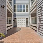 a view of a house with a door and a window