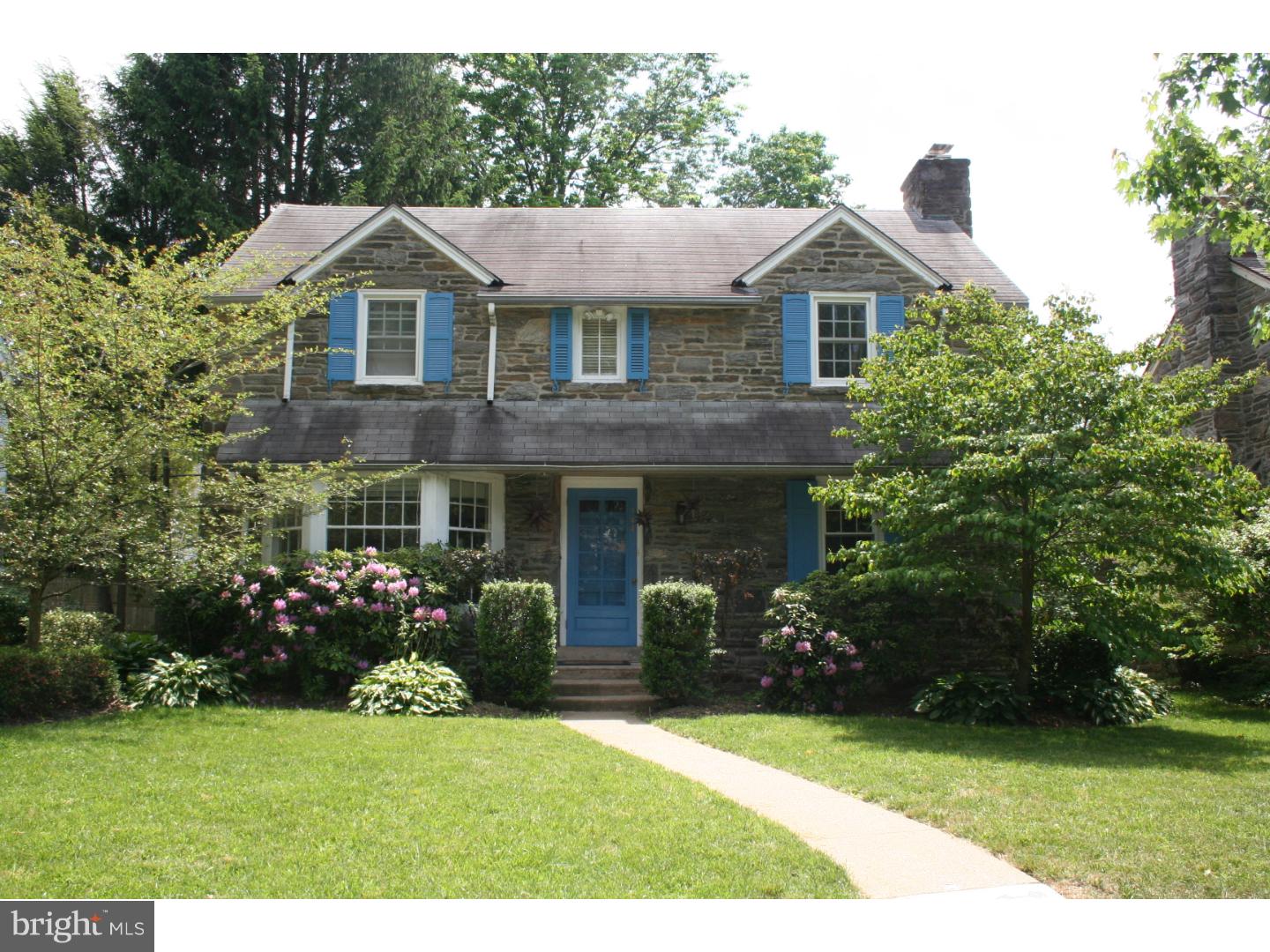 144 Henley Road Wynnewood, PA 19096 - Photo 1 of 21 a front view of a house with a garden