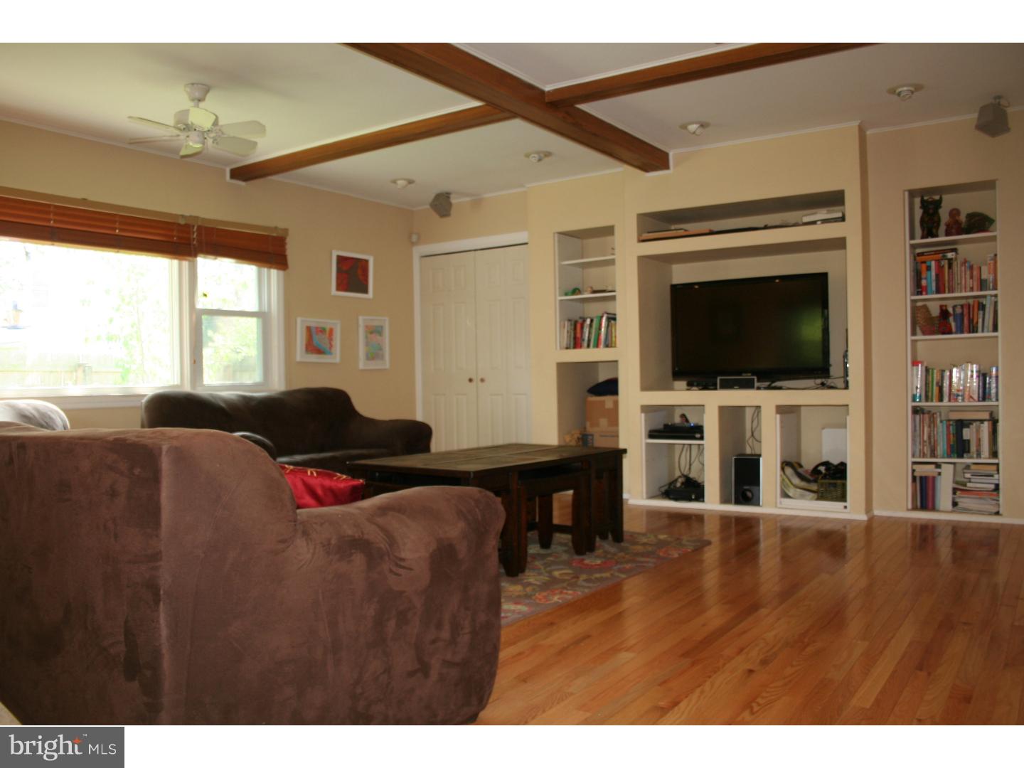 144 Henley Road Wynnewood, PA 19096 - Photo 11 of 21 a living room with furniture and a flat screen tv