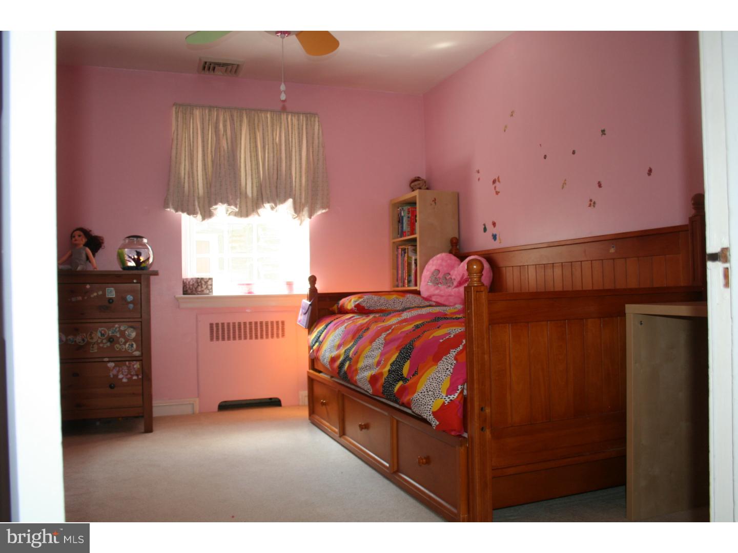 144 Henley Road Wynnewood, PA 19096 - Photo 19 of 21 a bedroom with a bed and a window
