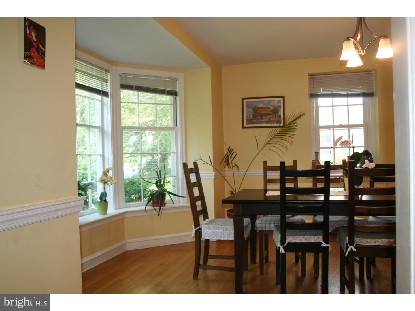 144 Henley Road Wynnewood, PA 19096 - Photo 6 of 21 a view of a dining room with furniture and a window