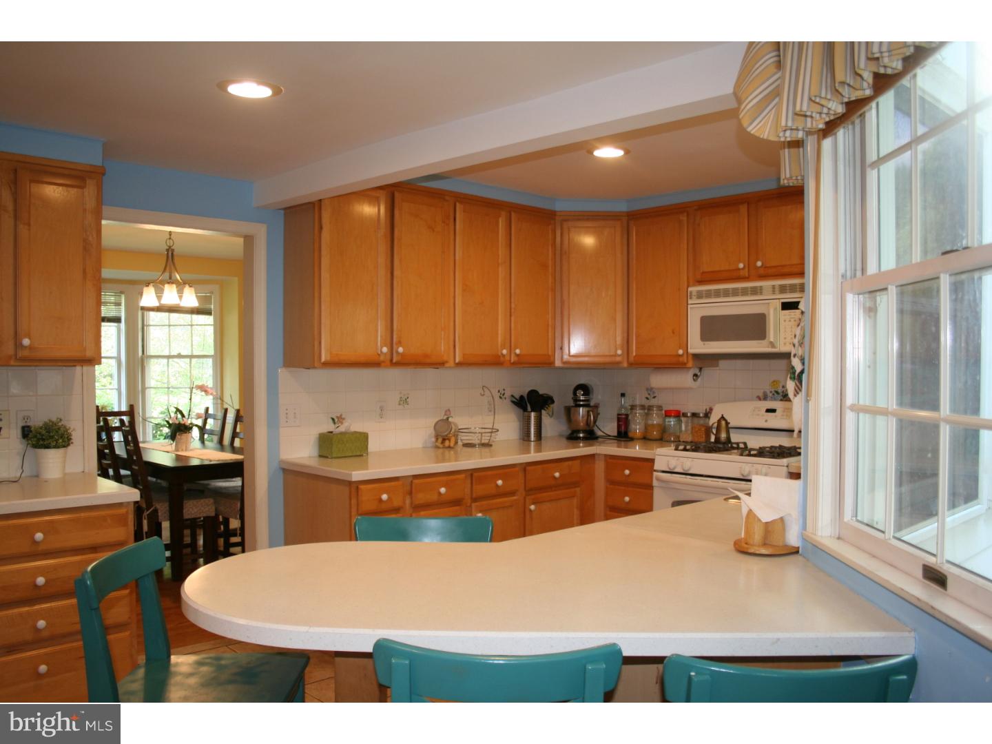 144 Henley Road Wynnewood, PA 19096 - Photo 9 of 21 a kitchen with a sink appliances cabinets and furniture